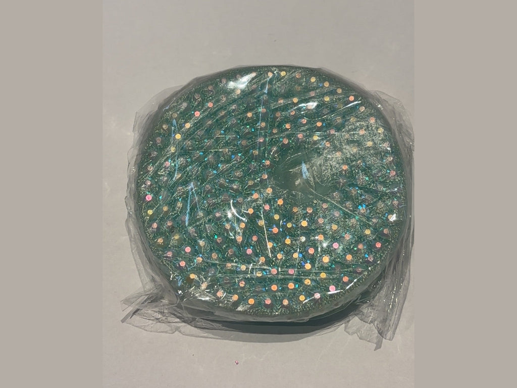 Green beaded 16oz lid wrapped in film with uniform iridescent bead texture