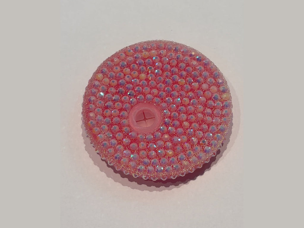 Pink beaded 16oz lid with faceted iridescent beads and recessed cross-shaped straw hole