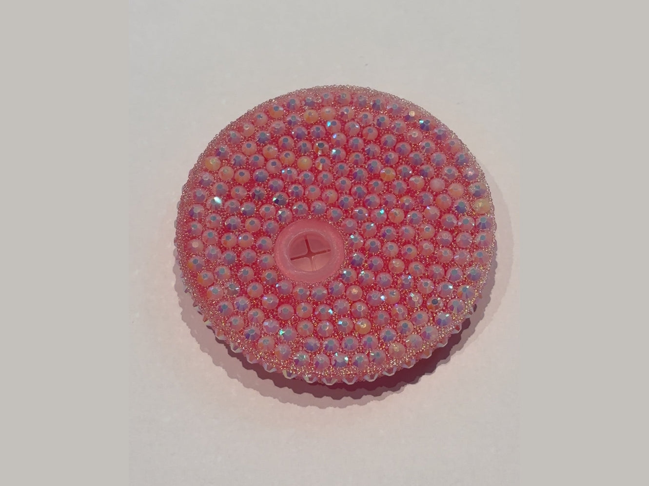 Pink beaded 16oz lid with faceted iridescent beads and recessed cross-shaped straw hole