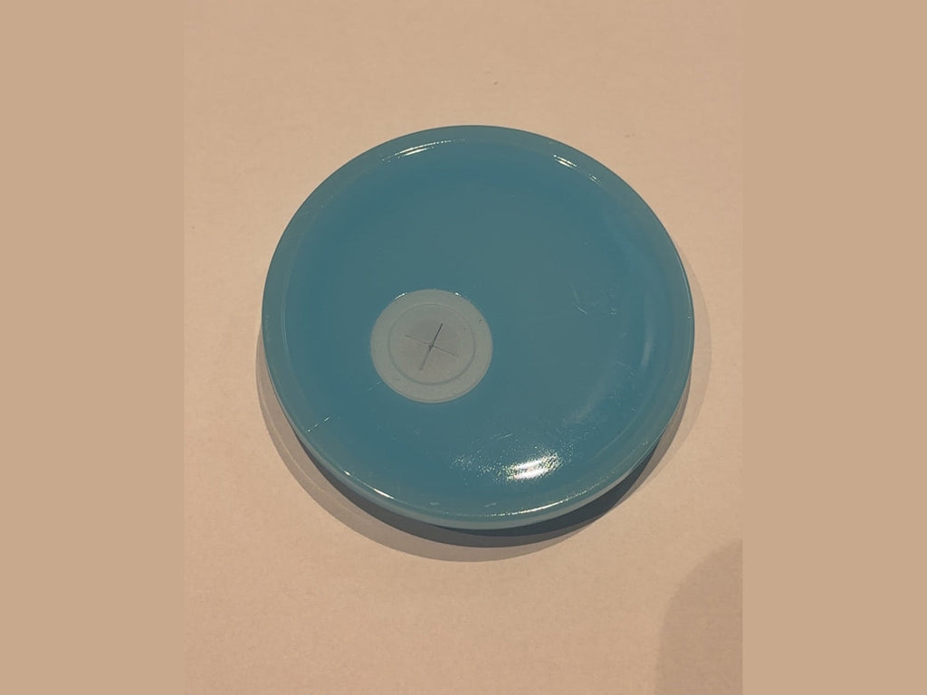 Solid light blue glossy 16oz cup lid with smooth surface and cross-shaped straw opening