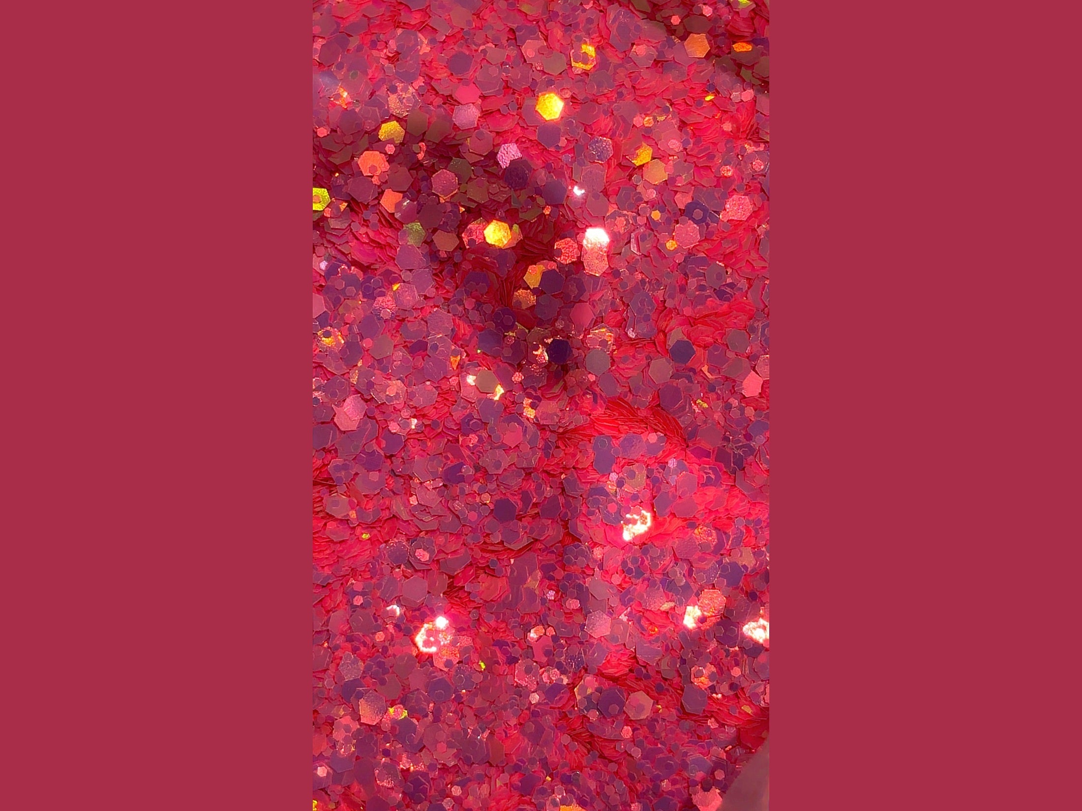 Pink glitter with purple and gold color shift, hexagonal particles