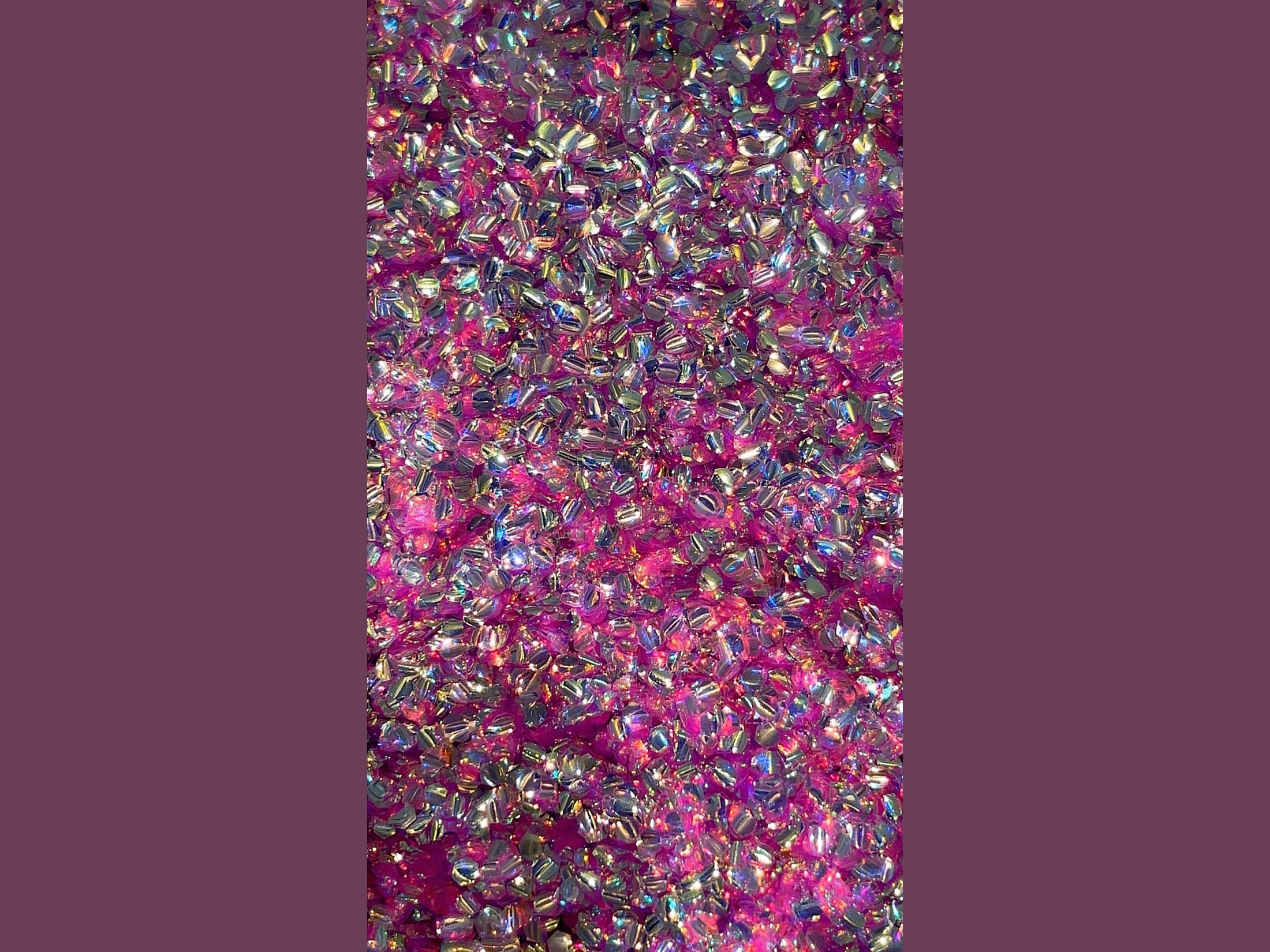 Magenta Magic bubble glitter with hot pink base, reflective silver bubbles and light-blue metallic flecks