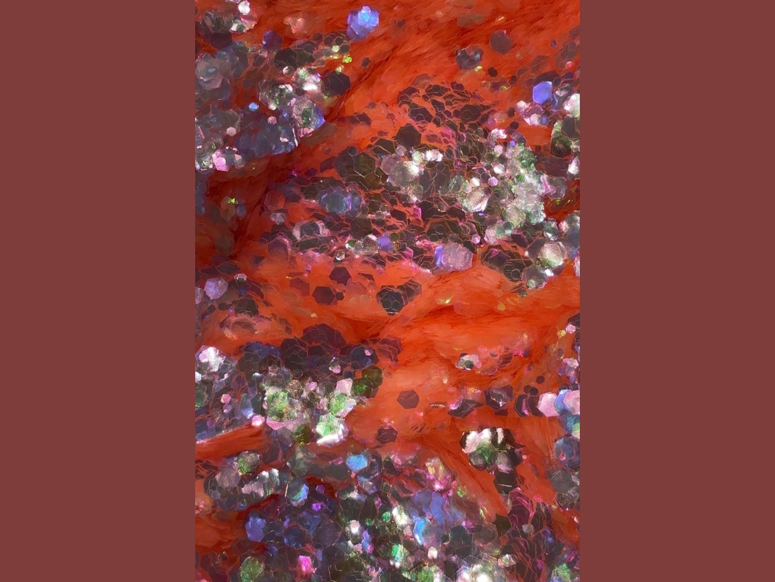 Emerald Flare pink glitter fabric with iridescent hexagonal silver and green color shift
