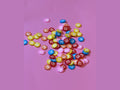 M&M's candy shaped plastic beads in red yellow blue orange pink and white with matte finish