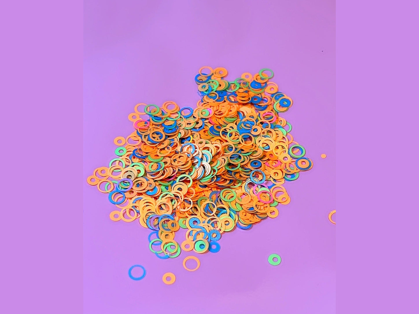 Mixed Bubbles colorful plastic rings in orange blue green and pink for crafting