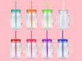 Six clear glass 20oz Mason jar tumblers with colorful lids and straws